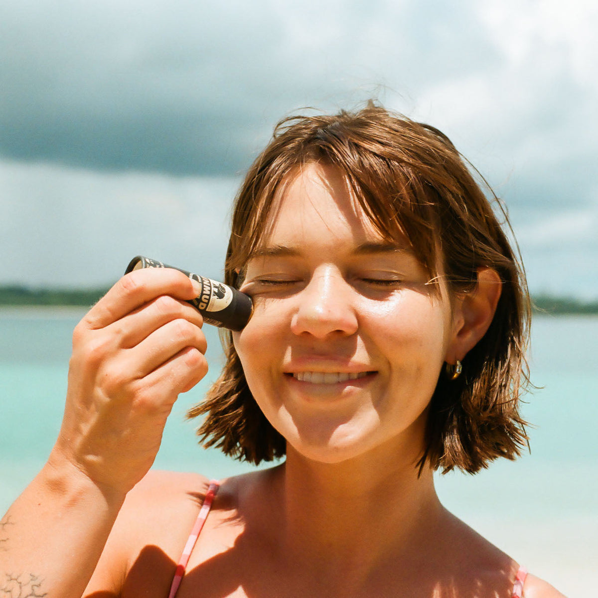 SUNMUD Sahara sunscreen stick in use